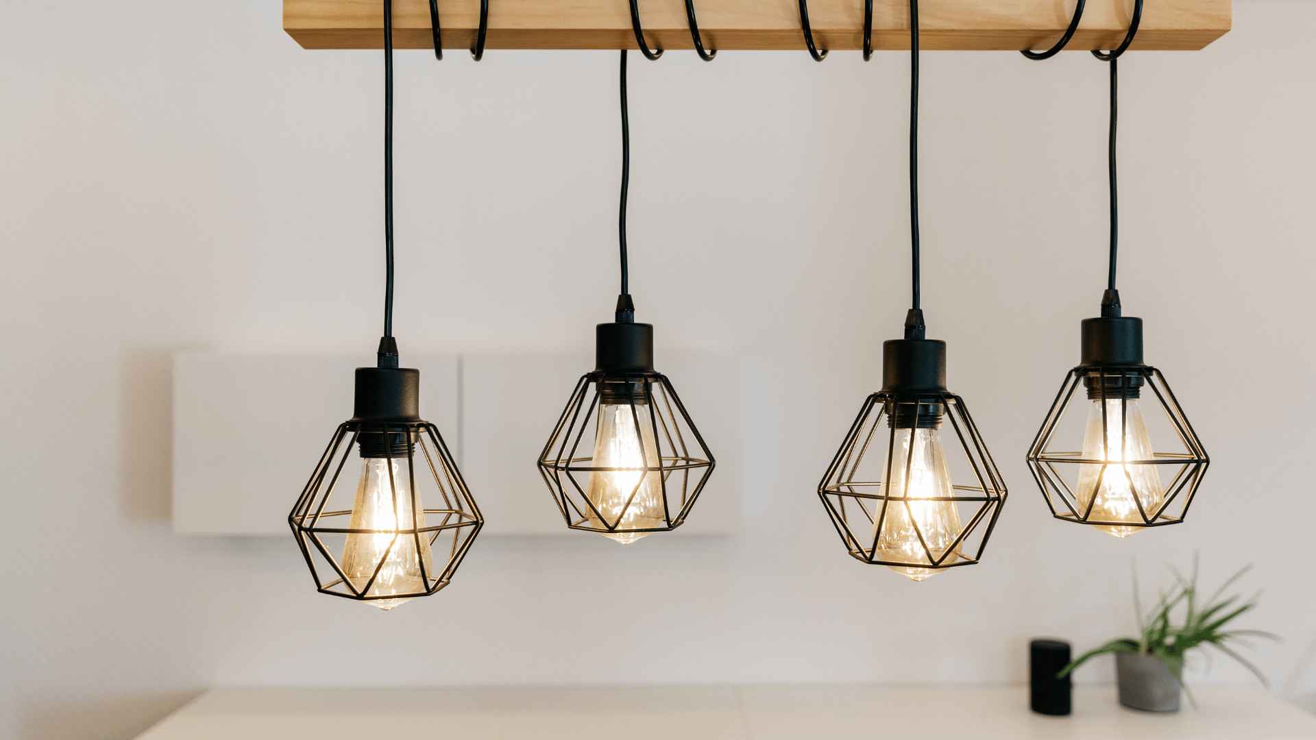 Industrial pendant light safely installed with UK-rated cable support